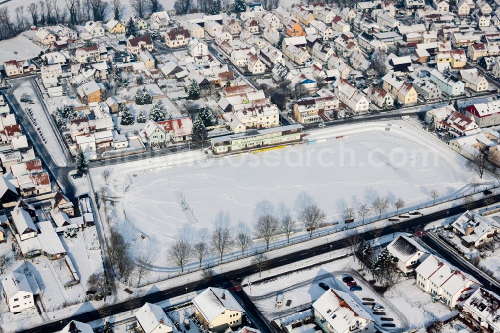 Rheinzabern from the bird's eye view: Wintry snowy Sports grounds and football pitch of Sportverein Olympia in Rheinzabern in the state Rhineland-Palatinate, Germany