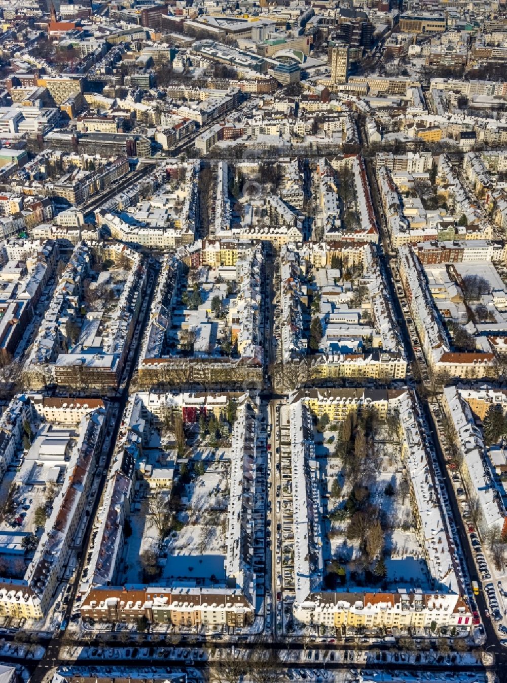 Aerial image Dortmund - Wintry snowy city view on the course of the street Alter Muehlenweg in the district Ruhrallee West in Dortmund in the Ruhr area in the state North Rhine-Westphalia, Germany