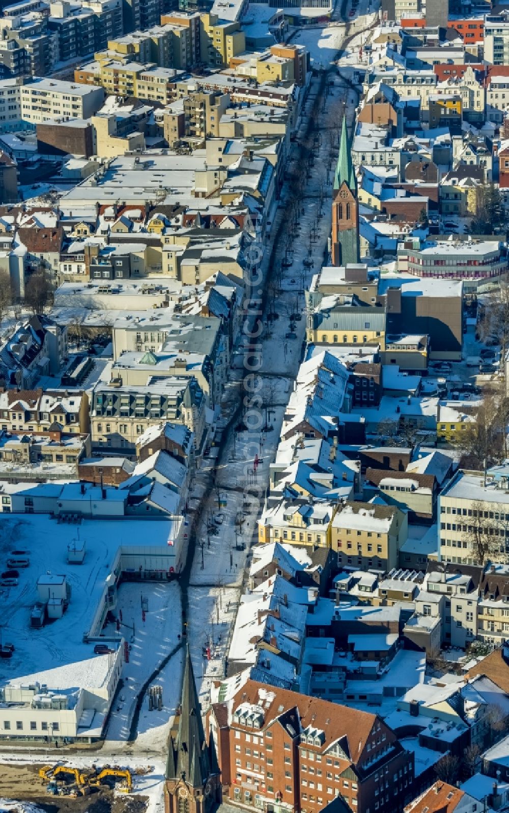 Herne from the bird's eye view: Wintry snowy city view on down town along the Bahnhofstrasse in Herne at Ruhrgebiet in the state North Rhine-Westphalia, Germany