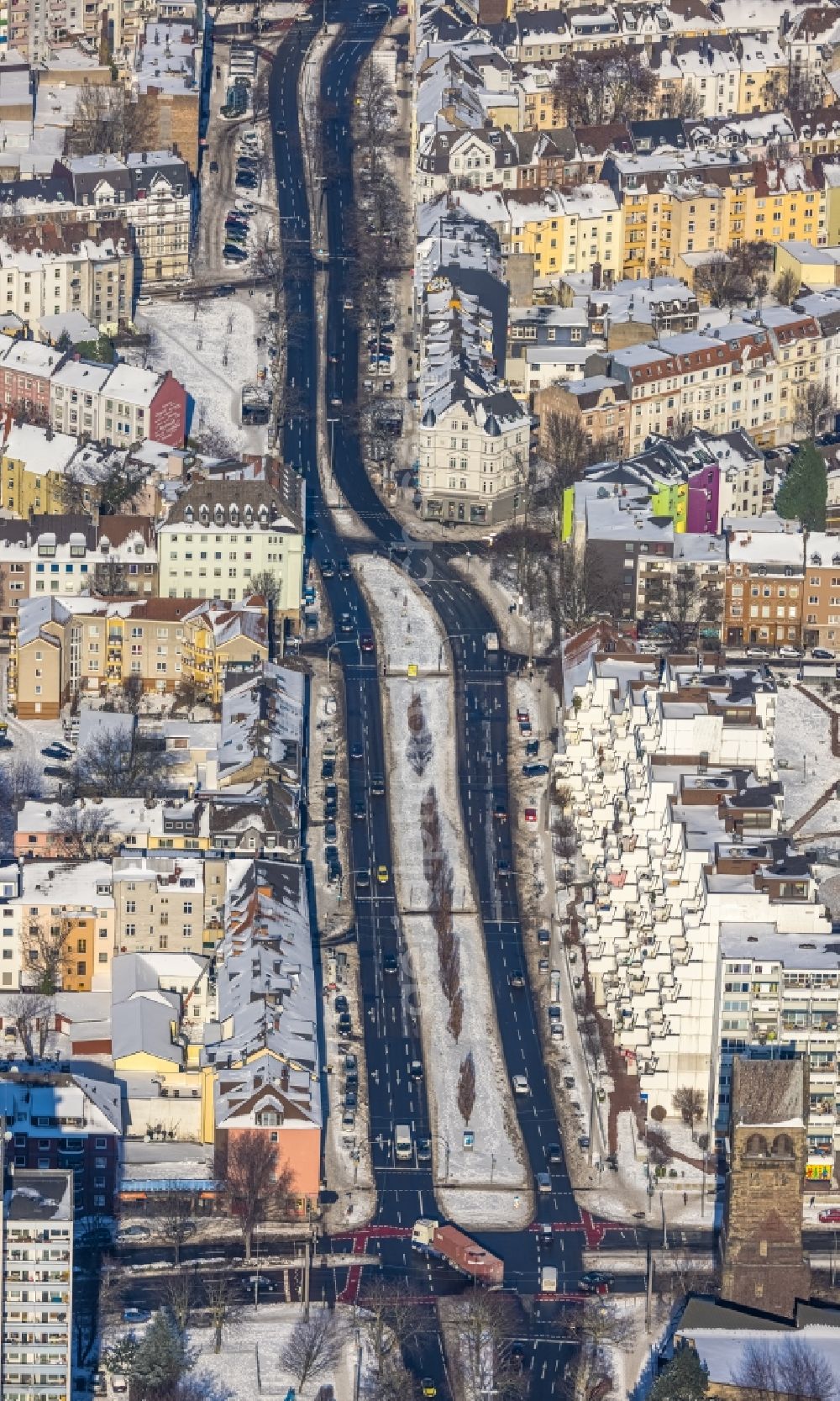 Dortmund from the bird's eye view: Wintry snowy city view on down town along the Bornstrasse in Dortmund at Ruhrgebiet in the state North Rhine-Westphalia, Germany