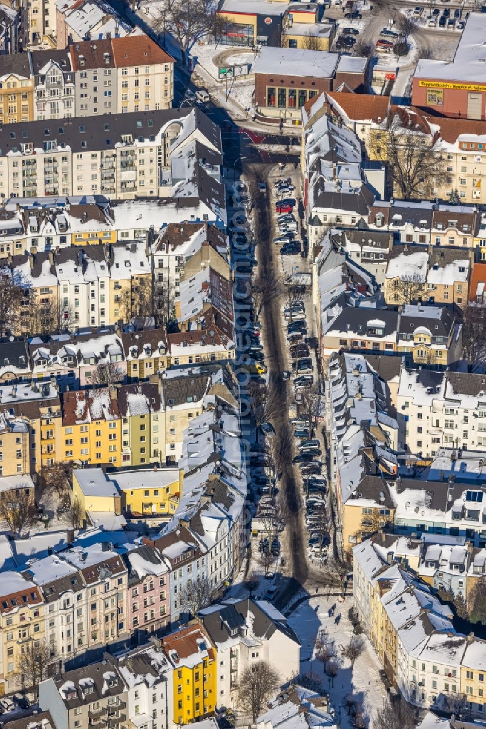 Aerial photograph Dortmund - Wintry snowy city view on down town along the Brunnenstrasse in Dortmund at Ruhrgebiet in the state North Rhine-Westphalia, Germany