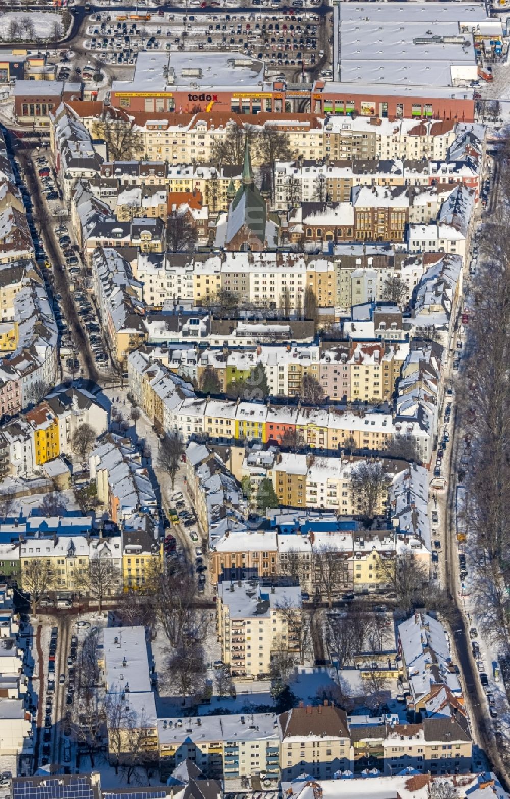 Dortmund from the bird's eye view: Wintry snowy city view on down town along the Brunnenstrasse in Dortmund at Ruhrgebiet in the state North Rhine-Westphalia, Germany