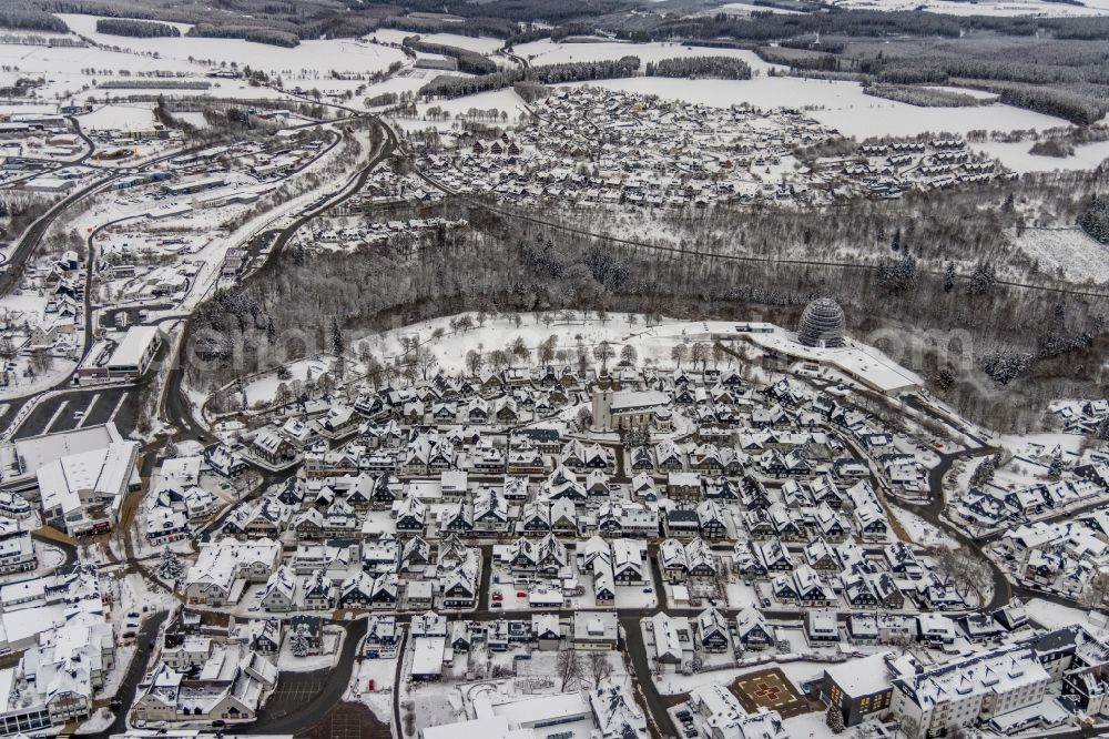 Winterberg from above - Wintry snowy city view on down town in Winterberg at Sauerland in the state North Rhine-Westphalia, Germany