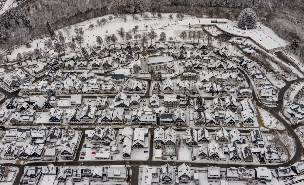 Aerial image Winterberg - Wintry snowy city view on down town in Winterberg at Sauerland in the state North Rhine-Westphalia, Germany