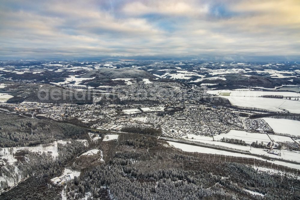 Meschede from above - Wintry snowy city area with outside districts and inner city area in Meschede at Sauerland in the state North Rhine-Westphalia, Germany