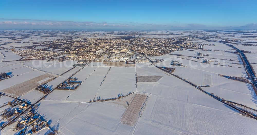 Aerial image Soest - Wintry snowy city area with outside districts and inner city area in Soest in the state North Rhine-Westphalia, Germany