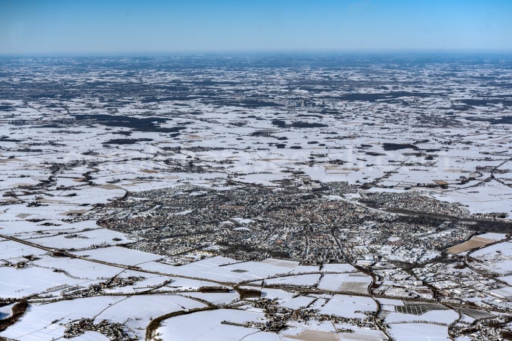 Soest from the bird's eye view: Wintry snowy city area with outside districts and inner city area in Soest in the state North Rhine-Westphalia, Germany