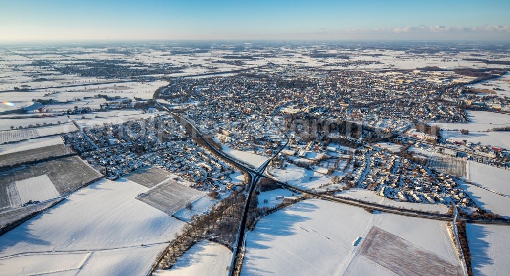 Werl from above - Wintry snowy city area with outside districts and inner city area in Werl in the state North Rhine-Westphalia, Germany