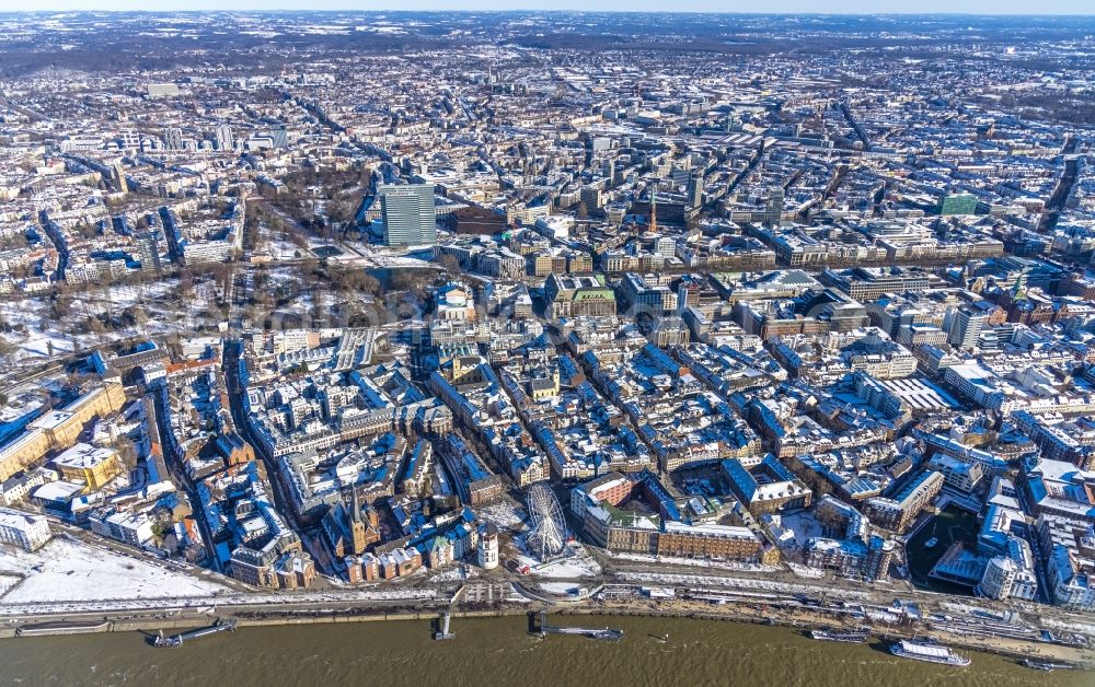 Düsseldorf from above - Wintry snowy city area with outside districts and inner city area in Duesseldorf at Ruhrgebiet in the state North Rhine-Westphalia, Germany