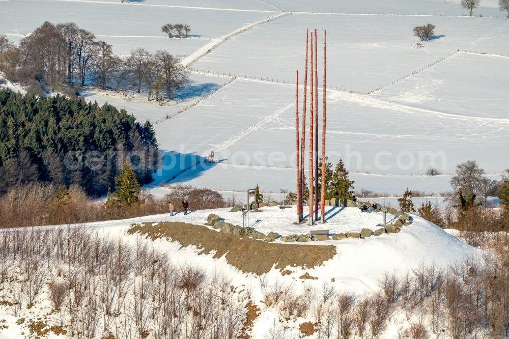 Aerial photograph Brilon - Wintry snowy Quarry for the mining and handling of Westdeutsche Grauwacke-Union GmbH in Brilon in the state North Rhine-Westphalia