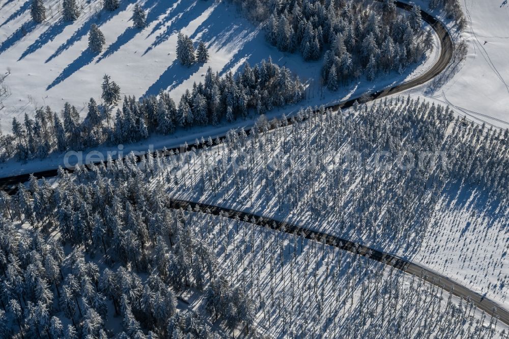 Aerial image Altlastenberg - Wintry snowy street - road guidance of Hochsauerland Hoehenstrasse in Altastenberg at Sauerland in the state North Rhine-Westphalia, Germany