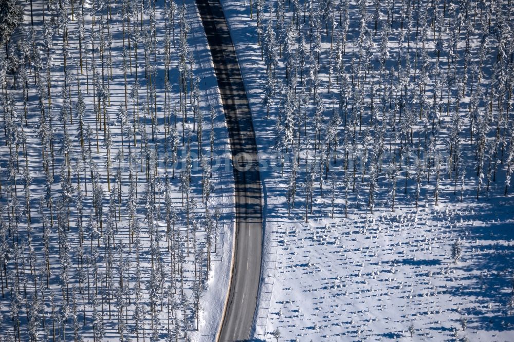 Aerial image Altlastenberg - Wintry snowy street - road guidance of Hochsauerland Hoehenstrasse in Altastenberg at Sauerland in the state North Rhine-Westphalia, Germany