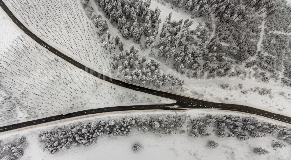 Altlastenberg from above - Wintry snowy street - road guidance of mit Gabelung Hochsauerland Hoehenstrasse in Altastenberg at Sauerland in the state North Rhine-Westphalia, Germany