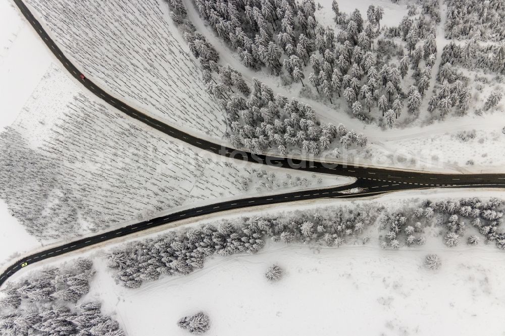 Aerial image Altlastenberg - Wintry snowy street - road guidance of mit Gabelung Hochsauerland Hoehenstrasse in Altastenberg at Sauerland in the state North Rhine-Westphalia, Germany