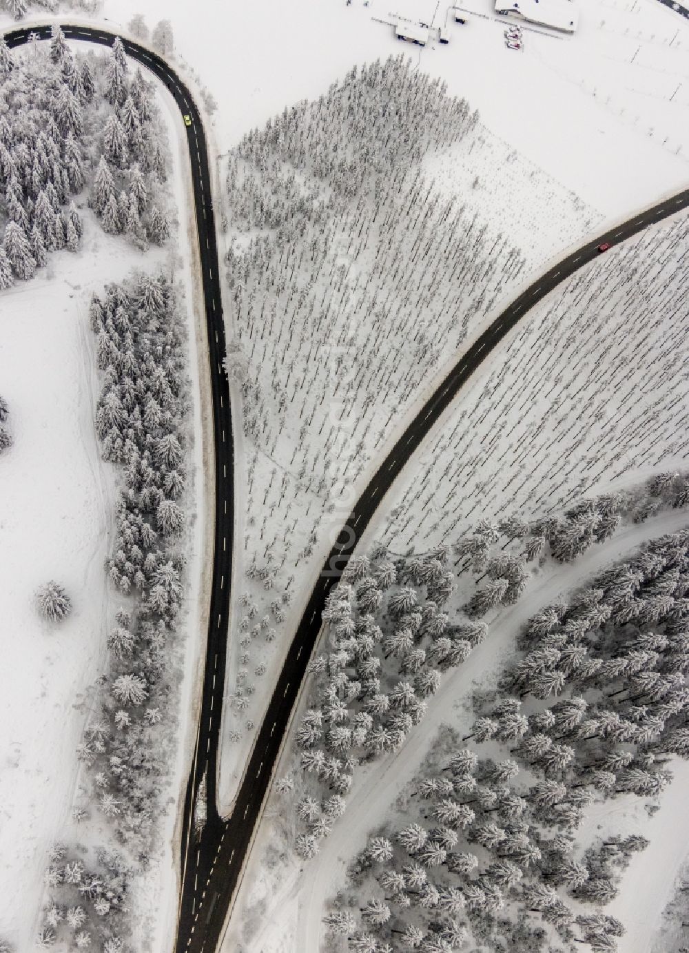 Altlastenberg from above - Wintry snowy street - road guidance of mit Gabelung Hochsauerland Hoehenstrasse in Altastenberg at Sauerland in the state North Rhine-Westphalia, Germany