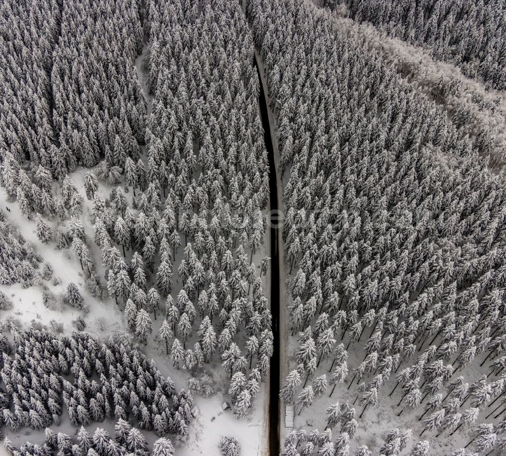 Aerial photograph Winterberg - Wintry snowy street - road guidance Rothaarsteig in Winterberg at Sauerland in the state North Rhine-Westphalia, Germany