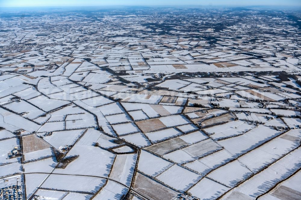 Bregenbeck from above - Wintry snowy structures on agricultural fields in Bregenbeck in the state Lower Saxony, Germany