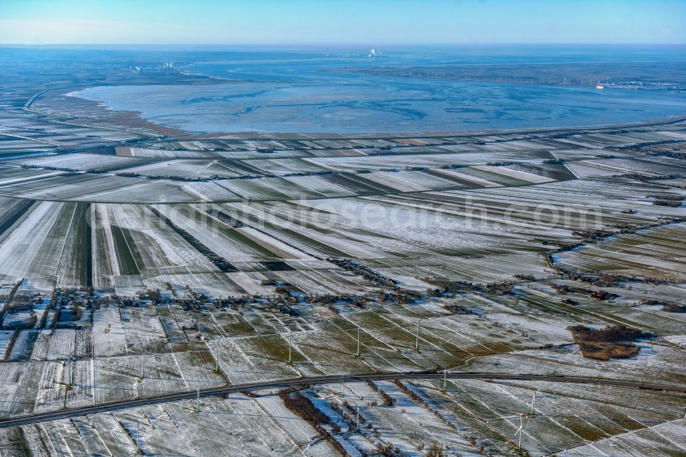 Aerial image Bunderhee - Wintry snowy structures on agricultural fields in Bunderhee in the state Lower Saxony, Germany