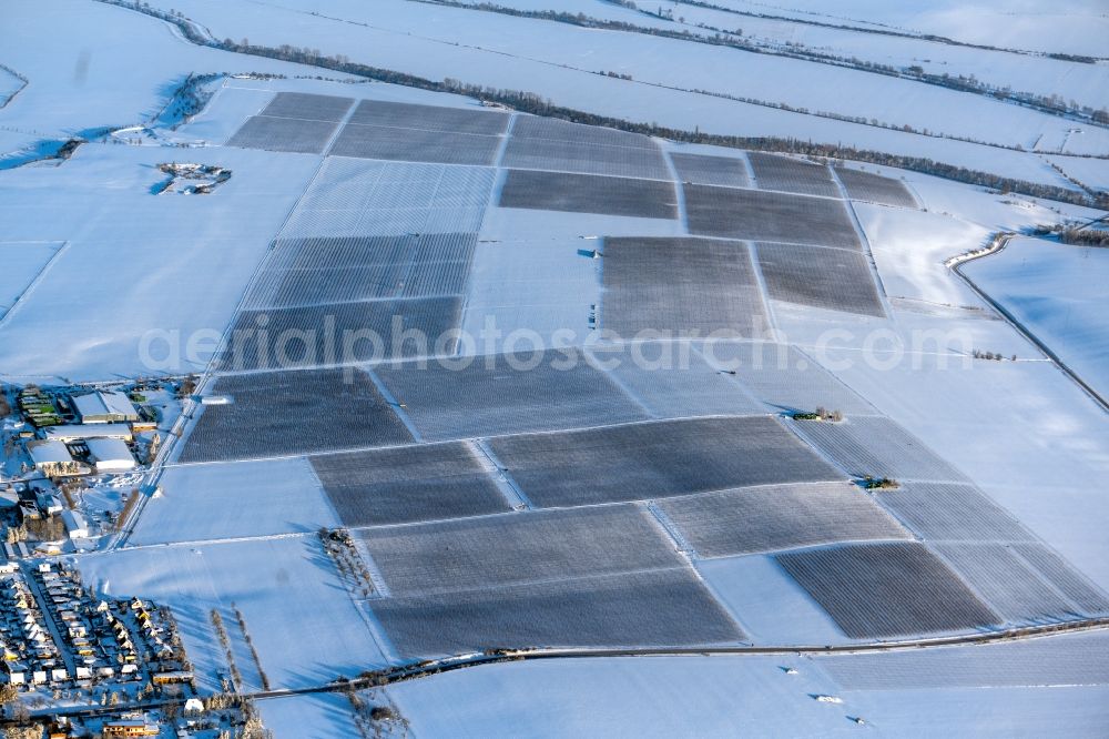 Kindelbrück from above - Wintry snowy structures on agricultural fields in Kindelbrueck in the state Thuringia, Germany