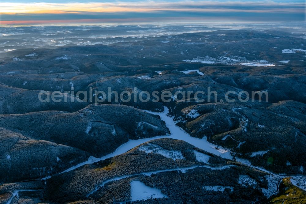 Luisenthal from above - Wintry snowy dam and shore areas at the lake of Ohratalsperre in the district Schwarzwald in Luisenthal in the state Thuringia, Germany