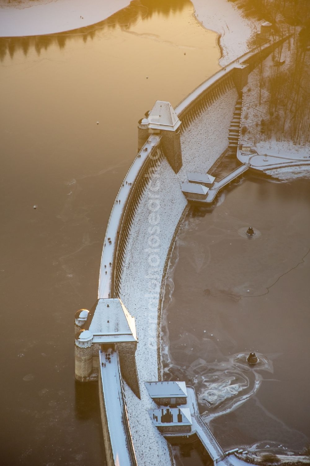 Möhnesee from above - Wintry snowy Dam and shore areas at the lake Moehnesee in the state North Rhine-Westphalia