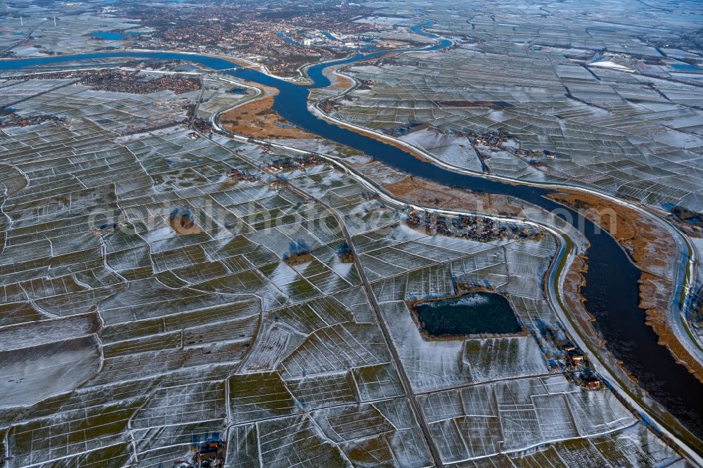 Leer (Ostfriesland) from above - Wintry snowy riparian zones on the course of the river of Ems in Leer (Ostfriesland) in the state Lower Saxony, Germany