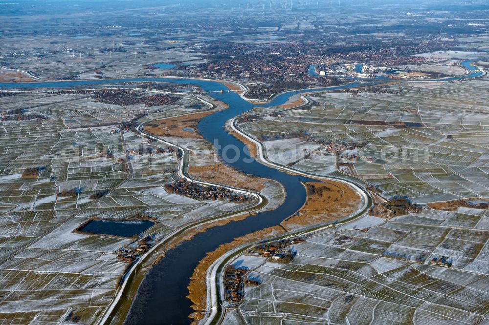 Leer (Ostfriesland) from the bird's eye view: Wintry snowy riparian zones on the course of the river of Ems in Leer (Ostfriesland) in the state Lower Saxony, Germany