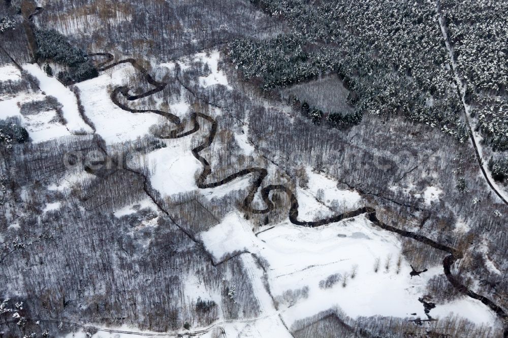 Aerial photograph Wissembourg - Wintry snowy Curved loop of the riparian zones on the course of the river of Lauter in Wissembourg in Grand Est, France