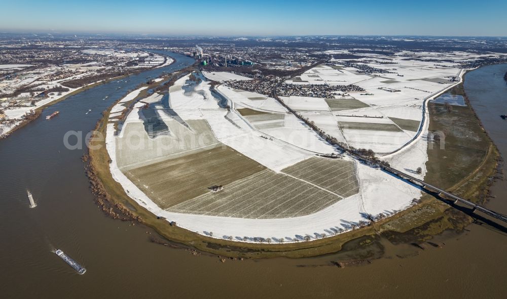 Aerial image Uerdingen - Wintry snowy bank areas on the course of the river Rhine in Uerdingen in the state North Rhine-Westphalia, Germany