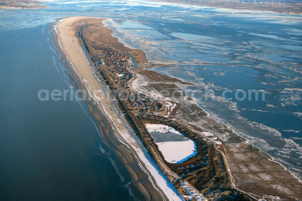 Aerial image Juist - Wintry snowy riparian areas on the lake area of Hammersee in Juist in the state Lower Saxony, Germany