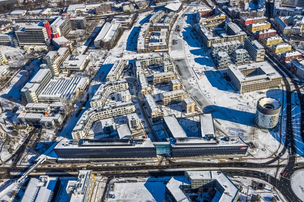 Essen from the bird's eye view: Wintry snowy administration building of the company of Funke Mediengruppe on Berliner Platz in Essen in the state North Rhine-Westphalia, Germany