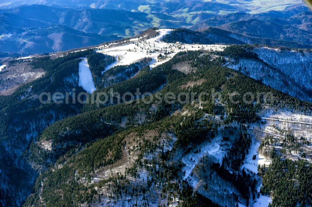 Aerial image Waldkirch - Wintry snowy forest and mountain scenery on Kandel on Schwarzwald in Waldkirch in the state Baden-Wurttemberg, Germany