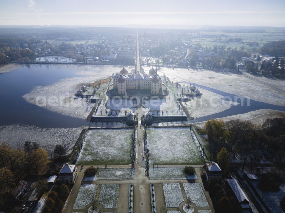 Moritzburg from above - Wintry snowy building and castle park systems of water- and huntig-castle on street Schlossallee in Moritzburg in the state Saxony, Germany