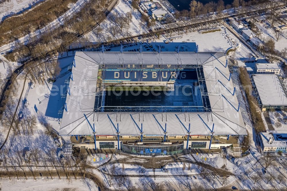 Aerial photograph Duisburg - Wintry snowy wedau Sports Park with the MSV-Arena (formerly Wedaustadion) in Duisburg in North Rhine-Westphalia