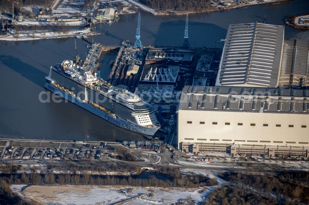 Aerial image Papenburg - Wintry snowy shipyard - site of the Meyer Werft in Papenburg in the state Lower Saxony, Germany