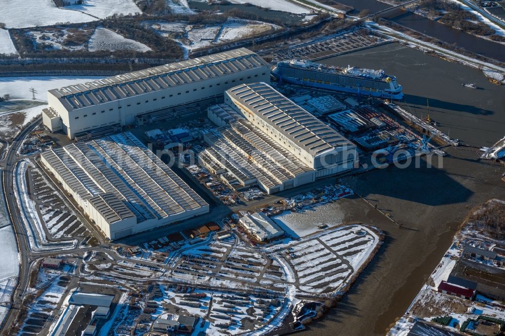 Aerial photograph Papenburg - Wintry snowy shipyard - site of the Meyer Werft in Papenburg in the state Lower Saxony, Germany