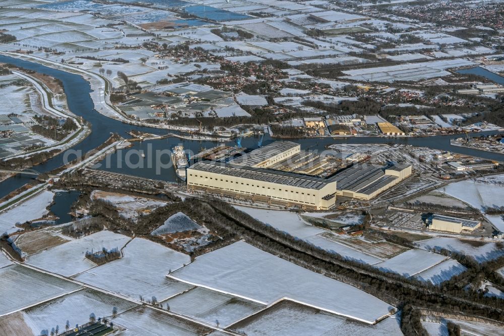 Papenburg from above - Wintry snowy shipyard - site of the Meyer Werft in Papenburg in the state Lower Saxony, Germany