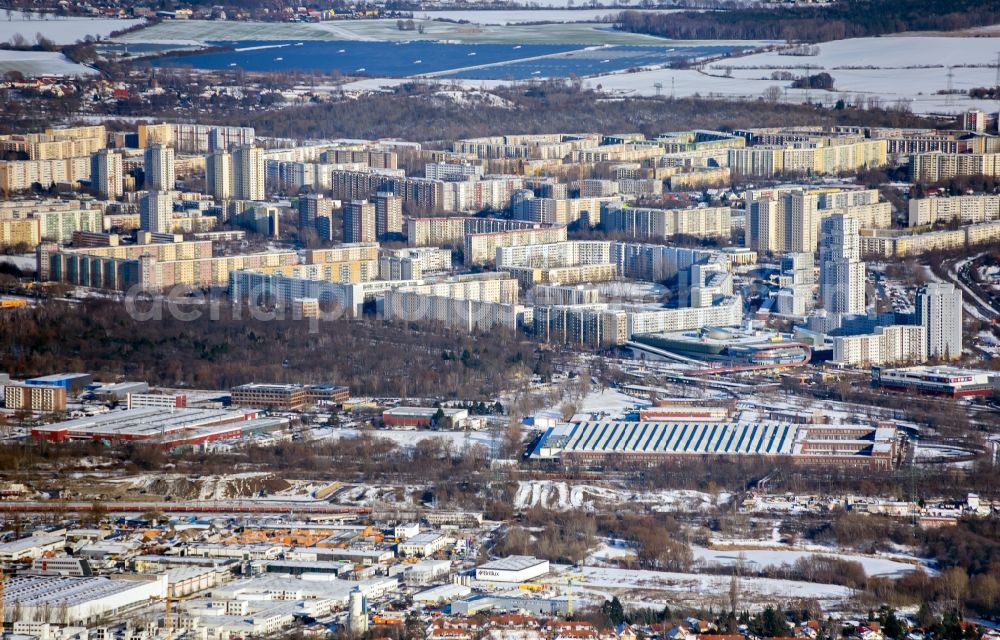 Berlin from above - Wintry snowy building and production halls on the premises of HASSE & WREDE GmbH on Georg-Knorr-Strasse in the district Marzahn in Berlin, Germany