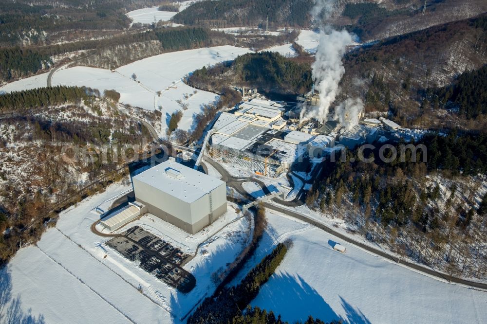 Aerial image Marsberg - Wintry snowy building and production halls on the premises of WEPA Papierfabrik Krengel P. GmbH & Co. KG, Zw.Werk Unterm Klausknapp in the district Giershagen in Marsberg in the state North Rhine-Westphalia