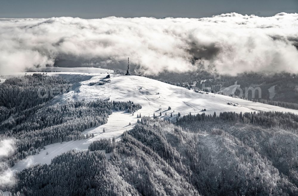 Feldberg (Schwarzwald) from the bird's eye view: Wintry snowy weather conditions with cloud formation in Feldberg (Schwarzwald) in the state Baden-Wurttemberg, Germany