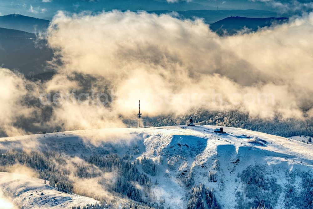 Aerial image Feldberg (Schwarzwald) - Wintry snowy weather conditions with cloud formation in Feldberg (Schwarzwald) in the state Baden-Wurttemberg, Germany