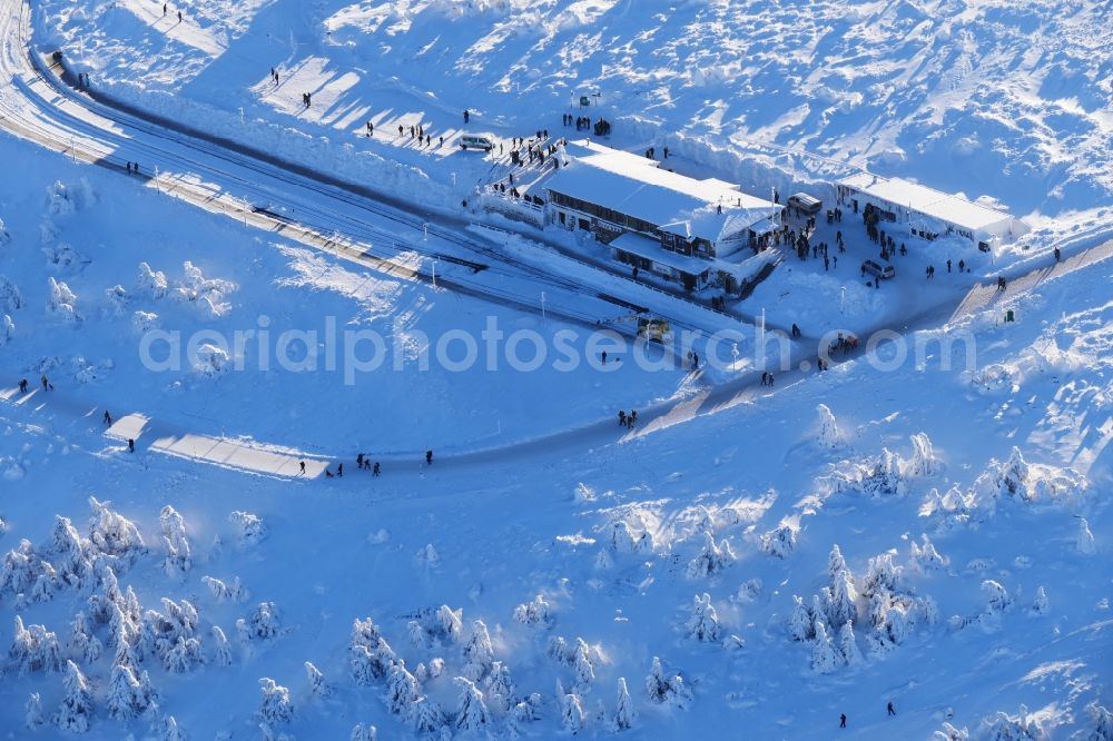 Aerial image Brocken - Wintry snowy wintry snowy station railway building on top of mountain Brocken in the state Saxony-Anhalt