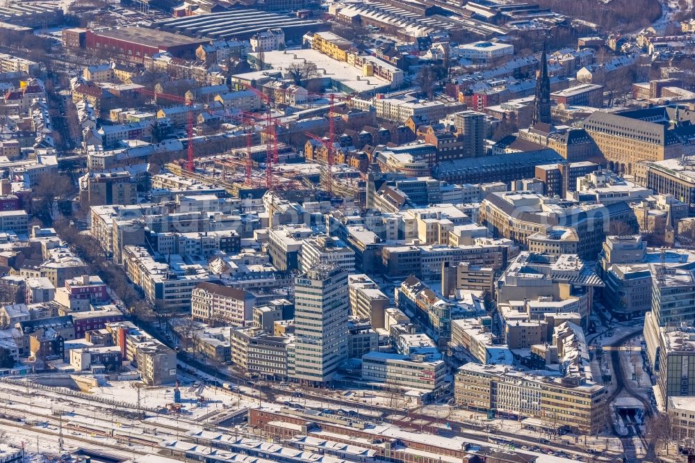 Aerial image Bochum - Wintry snowy residential and commercial building district along of Suedring - Hellweg - Luisenstrasse overlooking the Europahaus in Bochum in the state North Rhine-Westphalia, Germany. The Europahaus was designed by the architect Roman Reiser from 1959 and built from 1961 to 1962