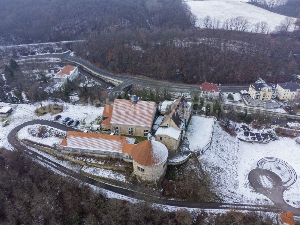 Dohna from above - Wintry snowy residential areas on the edge of agricultural land in Dohna in the state Saxony, Germany