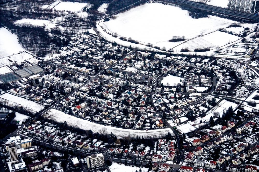 Karlsruhe from the bird's eye view: Wintry snowy Residential area of the multi-family house settlement Maerchenring in the district Rueppurr in Karlsruhe in the state Baden-Wuerttemberg, Germany