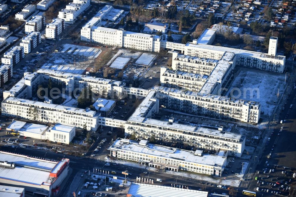 Berlin from above - Wintry snowy Lesley Lofts residential project on the grounds of the former Telefunken works and later that of the former U.S. Army Headquarters, McNair Barracks at Platz des 4. Juli between Goerzallee and Osteweg in Berlin Lichterfelde