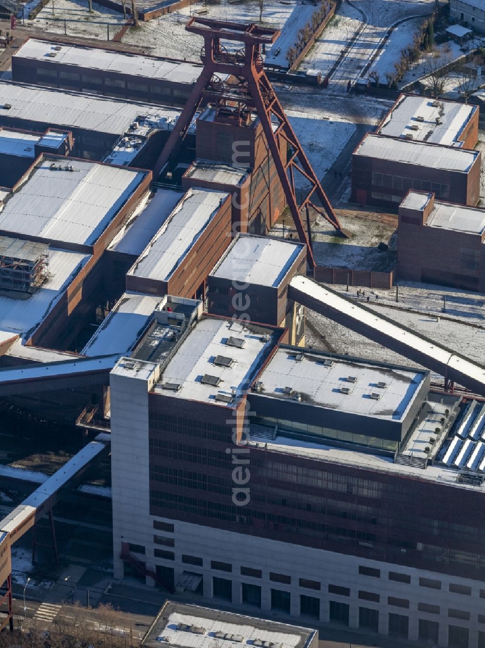 Essen from above - Winter walk on the ice rink in the coking plant Zeche Zollverein in Essen in North Rhine-Westphalia