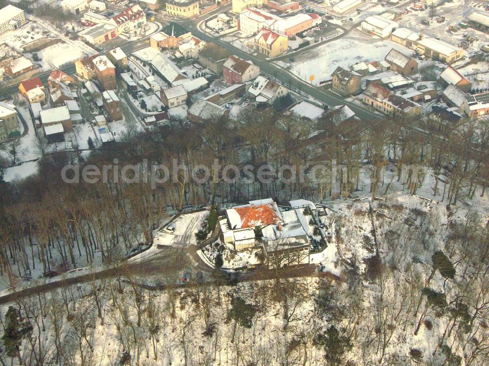 Aerial photograph Falkenberg / Mark / Brandenburg - 24.01.2006 Falkenberg / Brandenburg Blick auf das winterlich verschneite Bergrestaurant Carlsburg in Falkenberg/Mark. Auto: A 10, Abfahrt Berlin-Hohenschönhausen - B 158 Richtung Bad Freienwalde - B167 Richtung Eberswalde. Bergrestaurant Carlsburg, Inh. Familie Steinert, Burgstraße 9, 16259 Falkenberg/Mark, Tel.: (03 34 58) 2 05, Fax: (03 34 58) 3 08 90