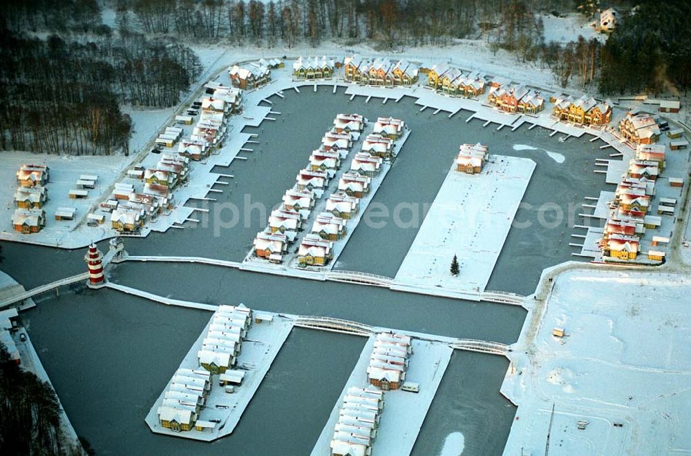 Rheinsberg from above - / Brandenburg Winterstimmung am fast fertigen Hafendorf Rheinsberg - Projektgesellschaft Hafendorf Rheinsberg GmbH,Lenaustr. 27,D-12305 Berlin,Telefon: +49 33931/34 161,Telefax: +49 33931/34 163,Email: info@hafendorf-rheinsberg.de,Achim Walder: