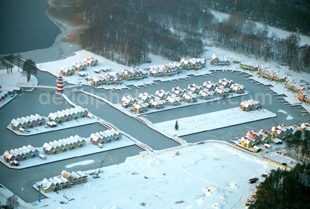 Aerial image Rheinsberg - / Brandenburg Winterstimmung am fast fertigen Hafendorf Rheinsberg - Projektgesellschaft Hafendorf Rheinsberg GmbH,Lenaustr. 27,D-12305 Berlin,Telefon: +49 33931/34 161,Telefax: +49 33931/34 163,Email: info@hafendorf-rheinsberg.de,Achim Walder: